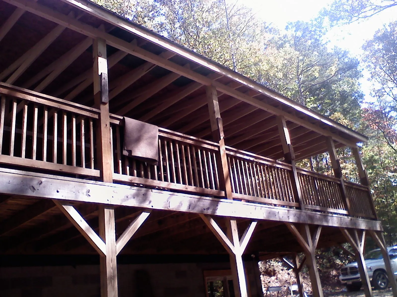 Timber framing under a new elevated porch and deck — Roof Leak Repair in Glouster by Roofing Brothers